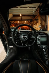 black steering wheel in a room