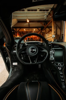 black steering wheel in a room