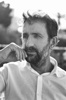 Black and white portrait of François Havelock, capturing his thoughtful gaze