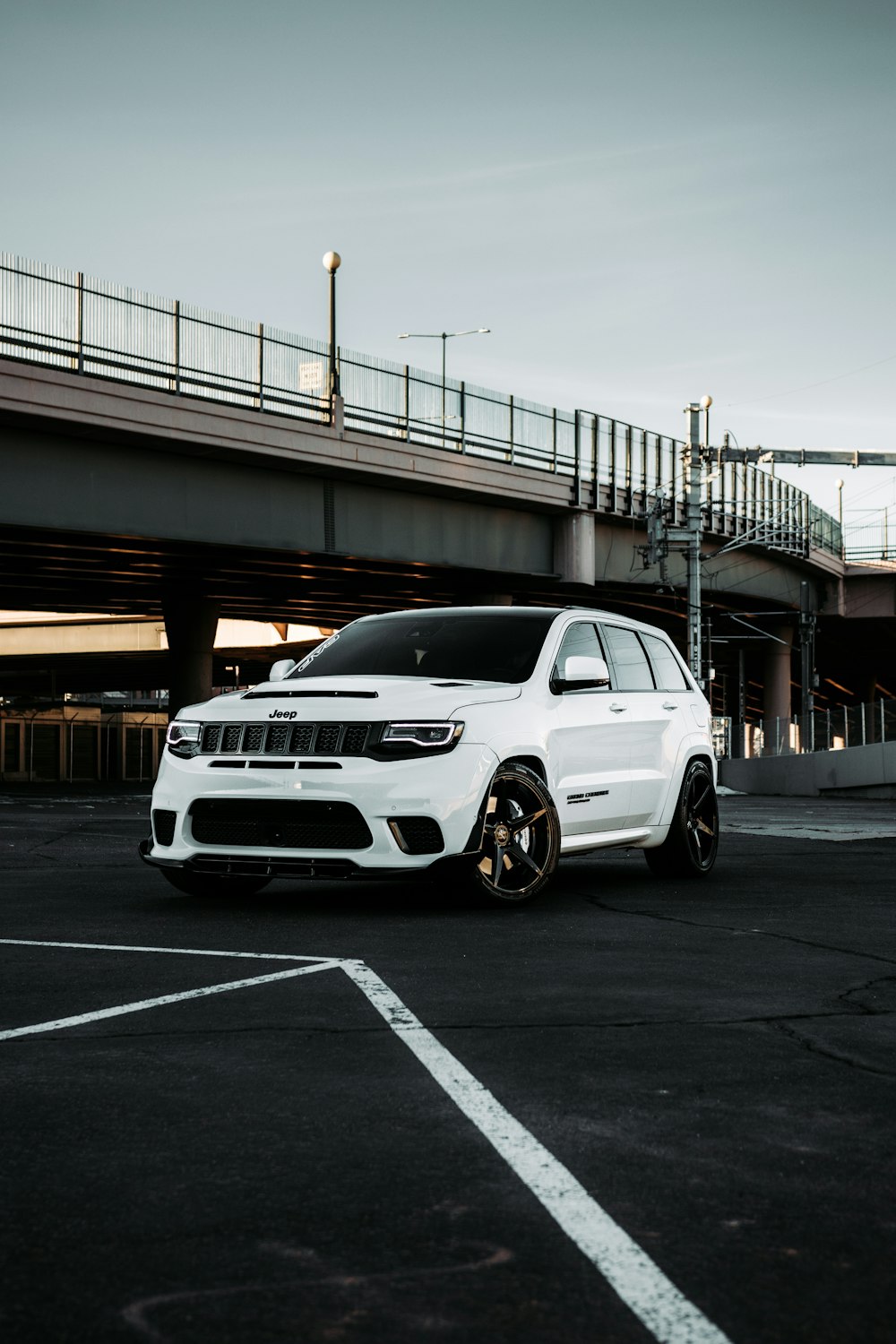 white bmw car on road during daytime