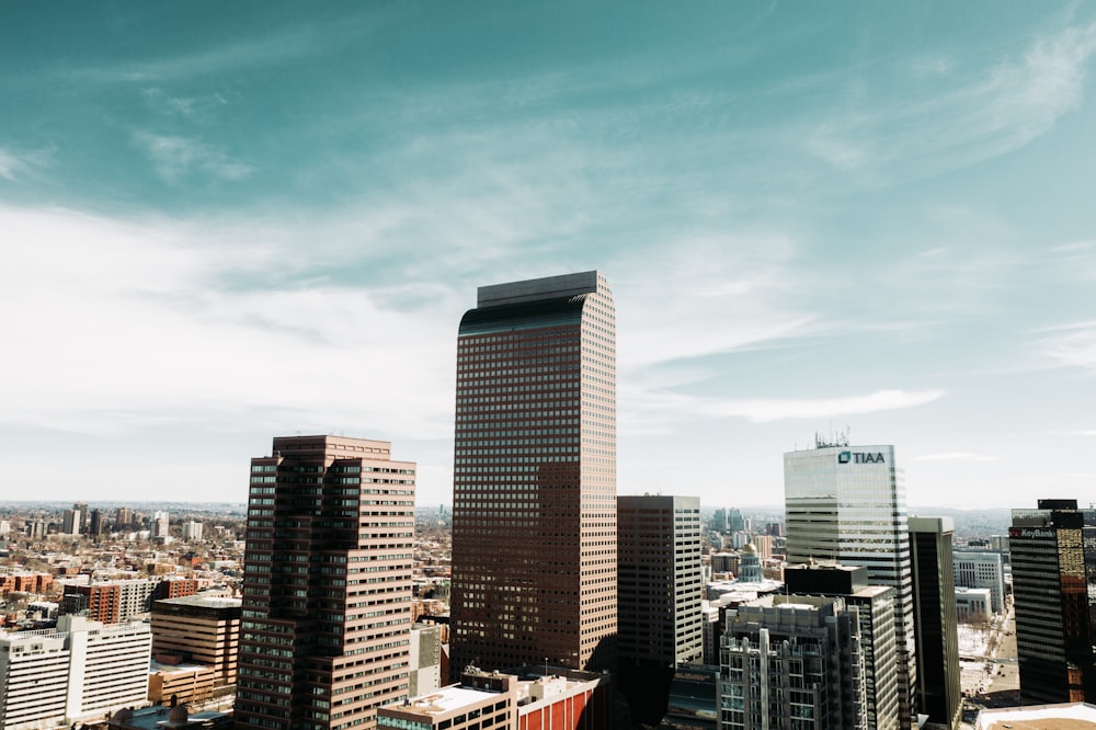 city buildings under blue sky during daytime