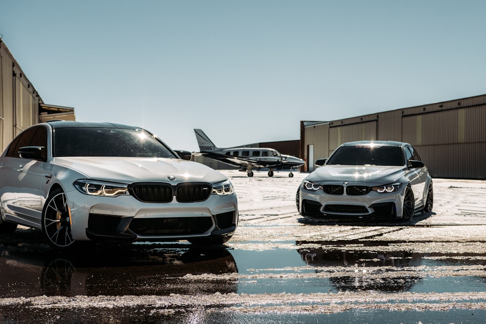 silver bmw car on snow covered ground during daytime