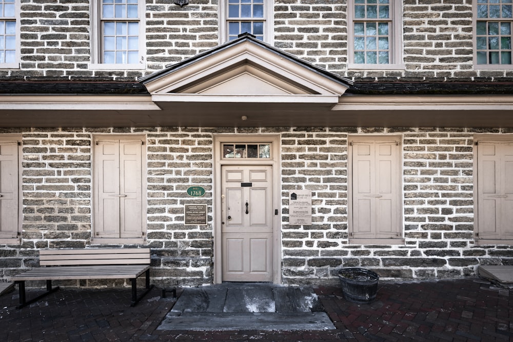 brown wooden door on brown concrete building