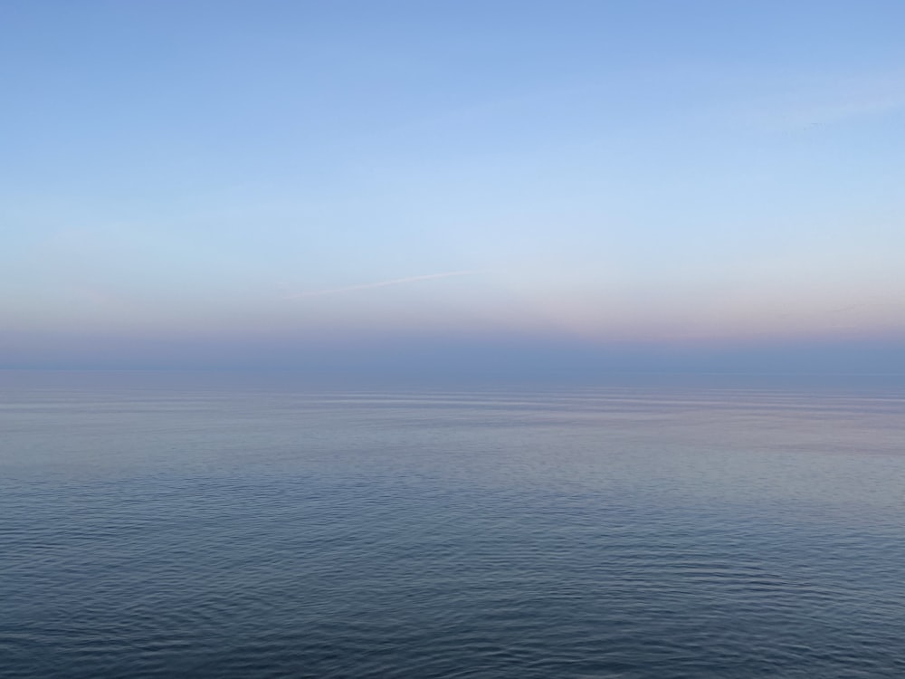 blue sea under blue sky during daytime