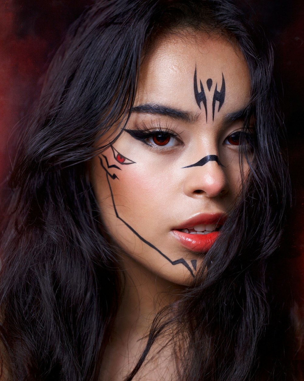 woman with black hair and red lipstick