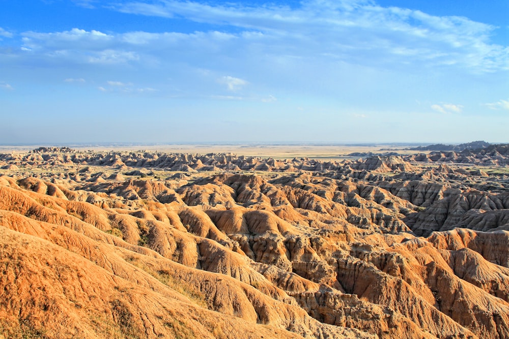 brown rock formation under blue sky during daytime