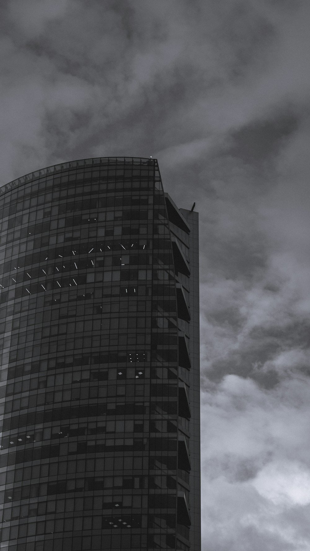 gray concrete building under gray clouds