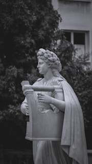 A glowing golden lyre resting on a marble pedestal with subtle soundwave patterns in the background.