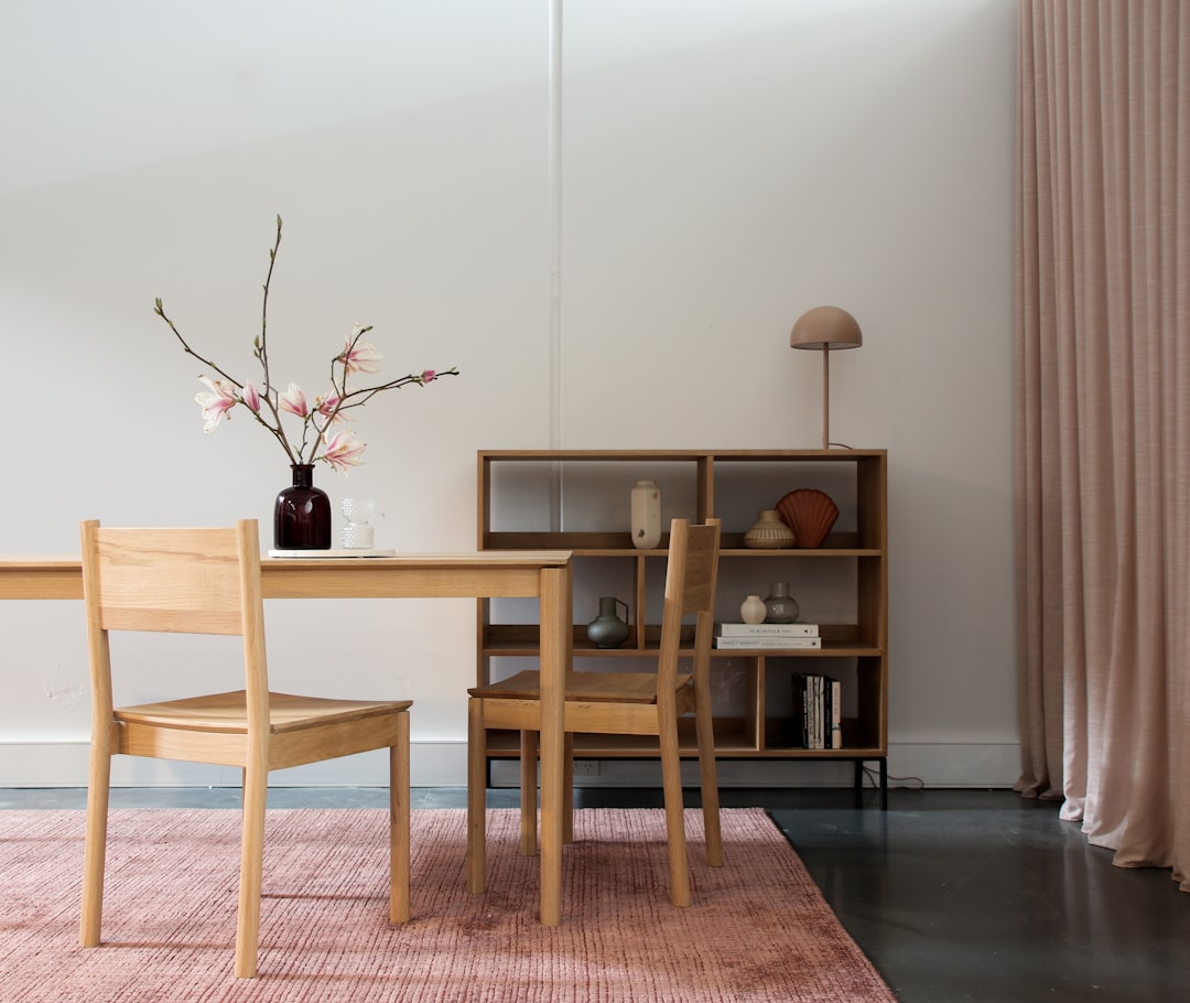 brown wooden dining table with chairs