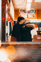 A warm scene of happy customers interacting with a business owner through heartfelt communication.