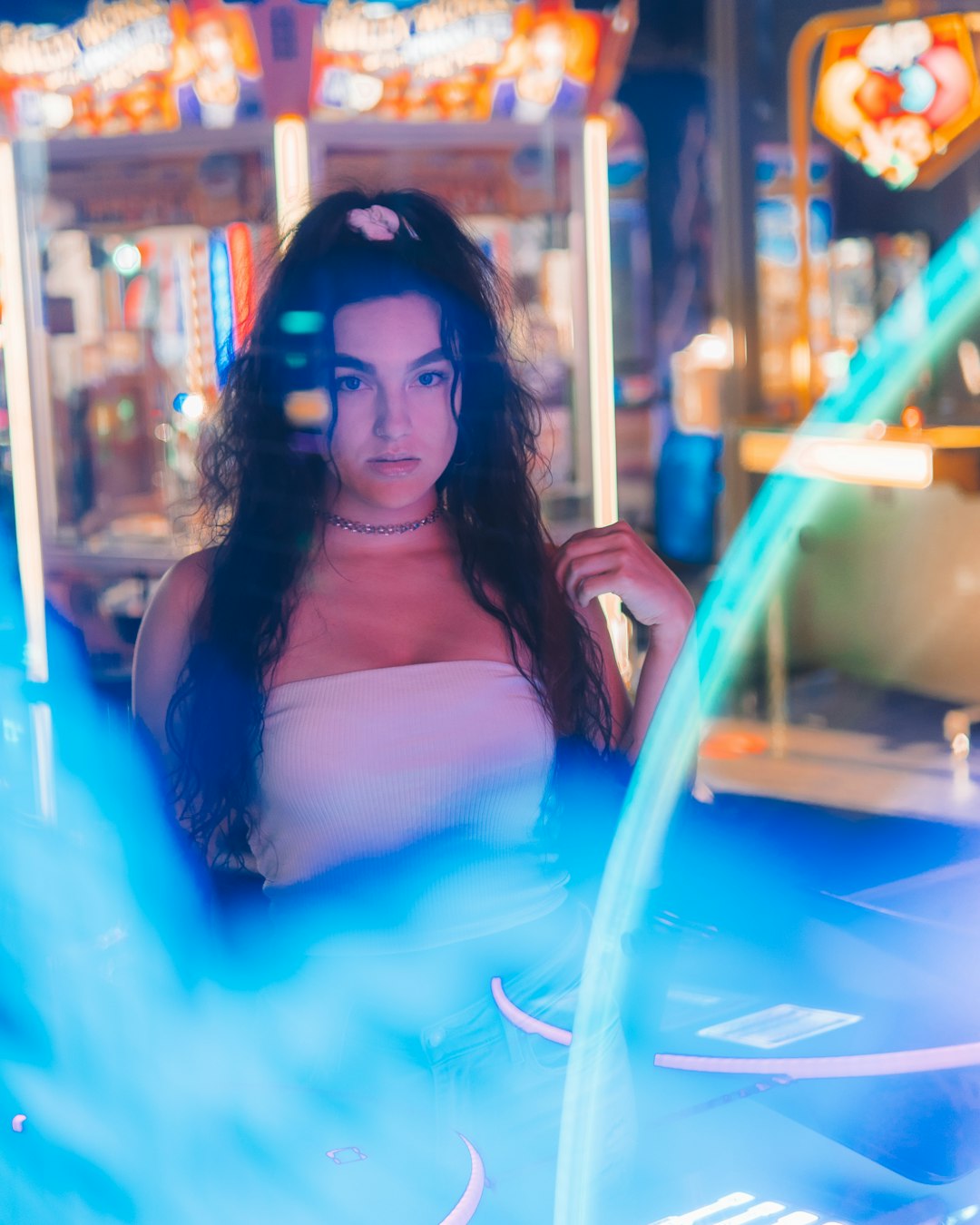 woman in white tube top and blue skirt