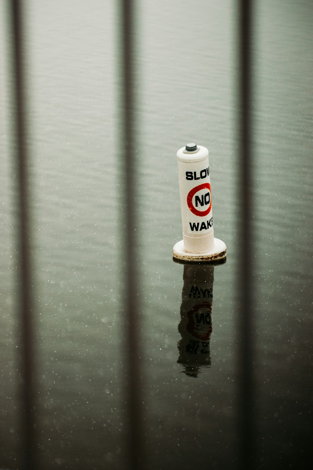 white and red plastic bottle