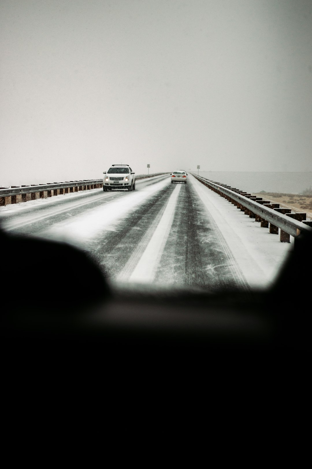 white car on road during daytime