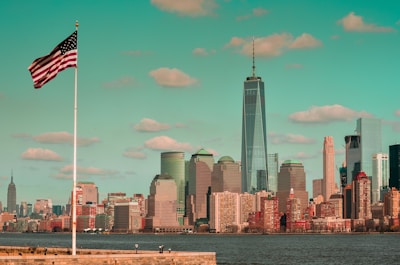 city skyline under blue sky during daytime