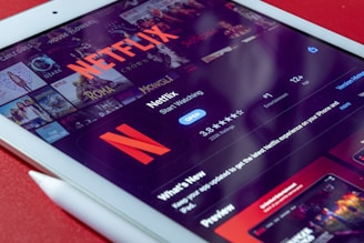 white tablet computer turned on displaying game