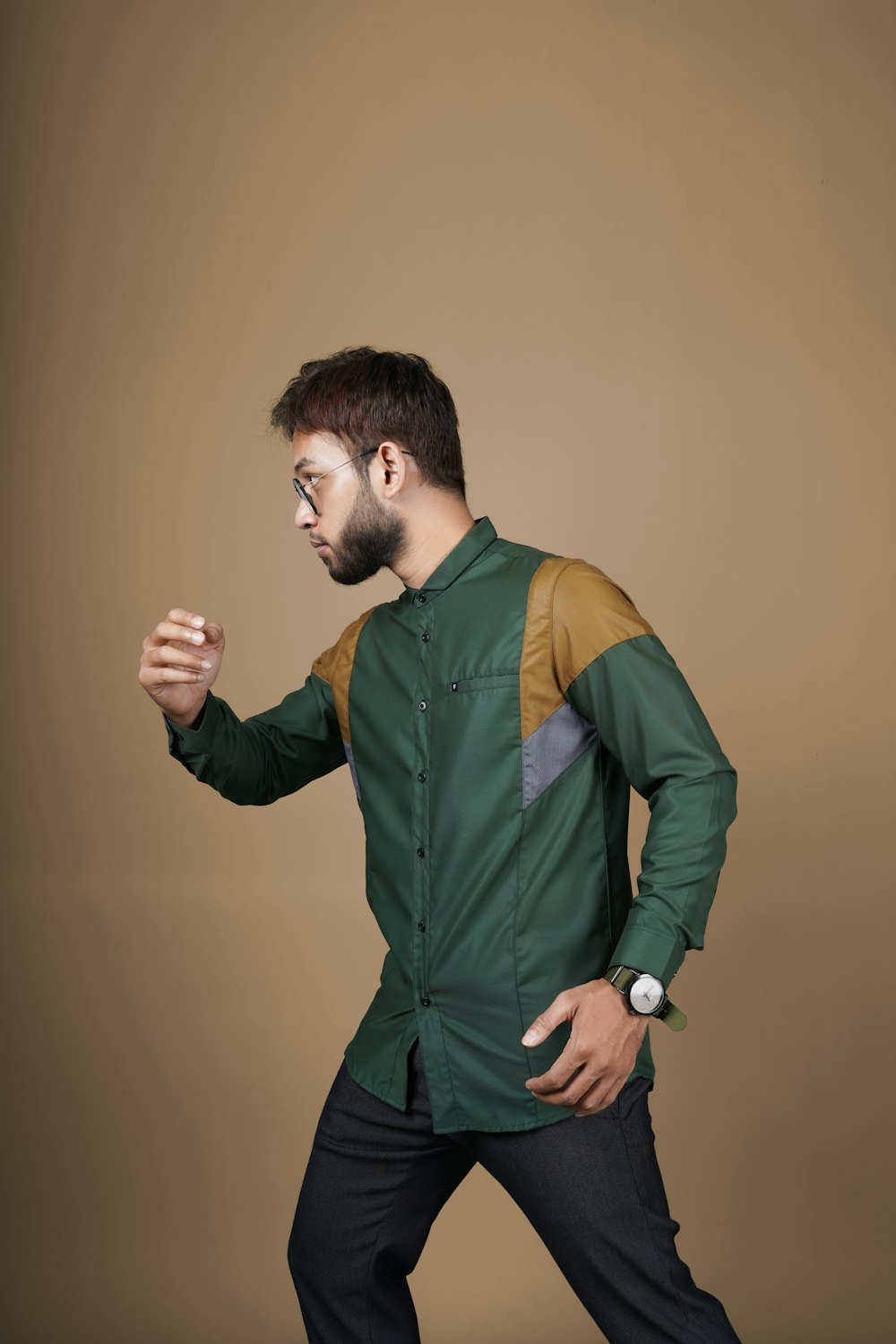 man in green and yellow long sleeve shirt