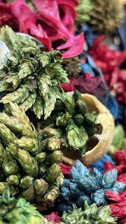 Close-up of dried flowers and spices used in niche perfume crafting.