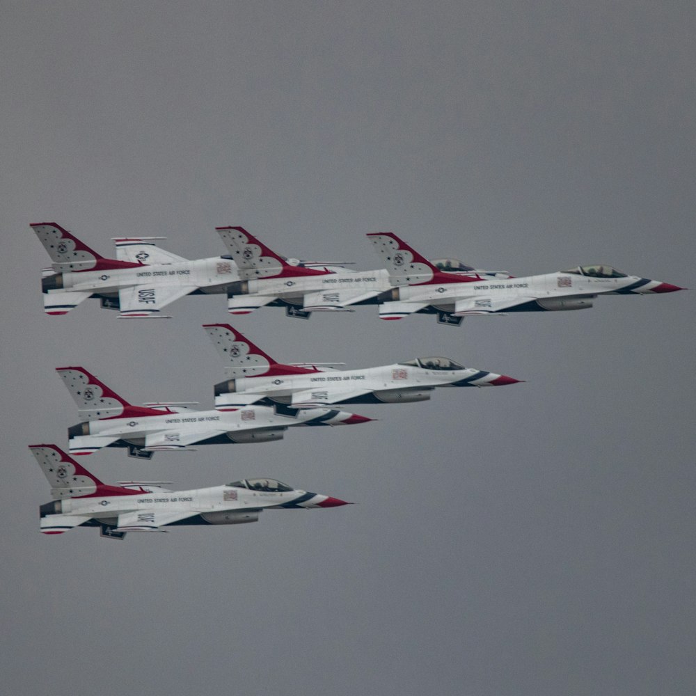 white and red jet plane