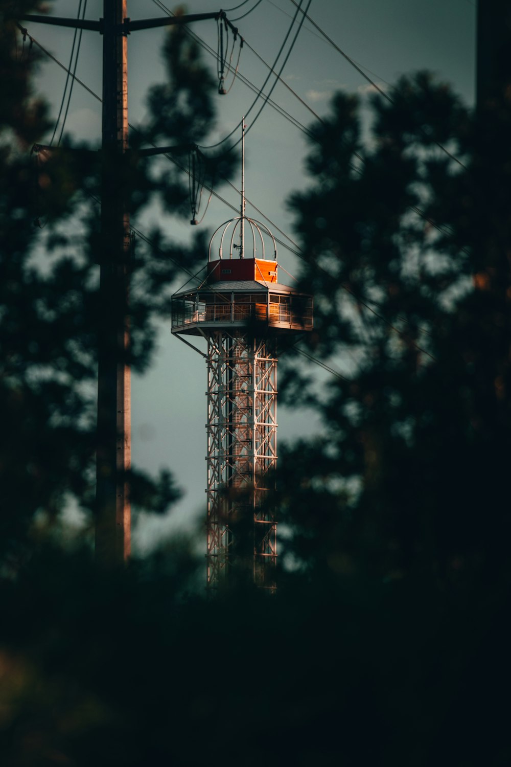 red and white tower during night time