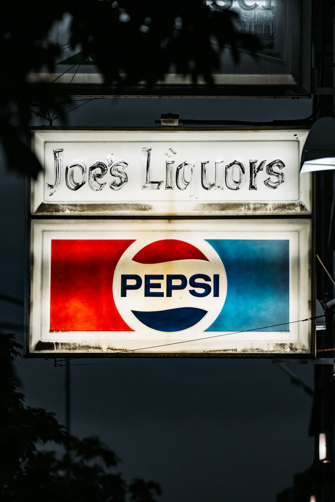 pepsi logo on white and blue signage