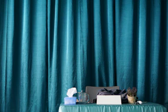 Close-up of various curtain replacement parts neatly arranged on a wooden table
