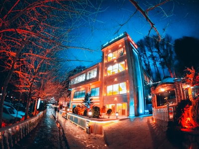 Evening view of the brightly lit Kolhapur branch building.