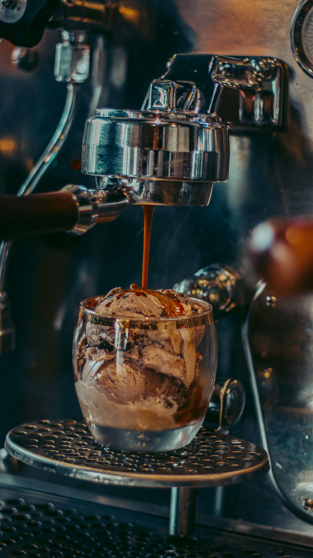 clear glass cup with brown liquid