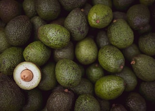 green fruits on black surface