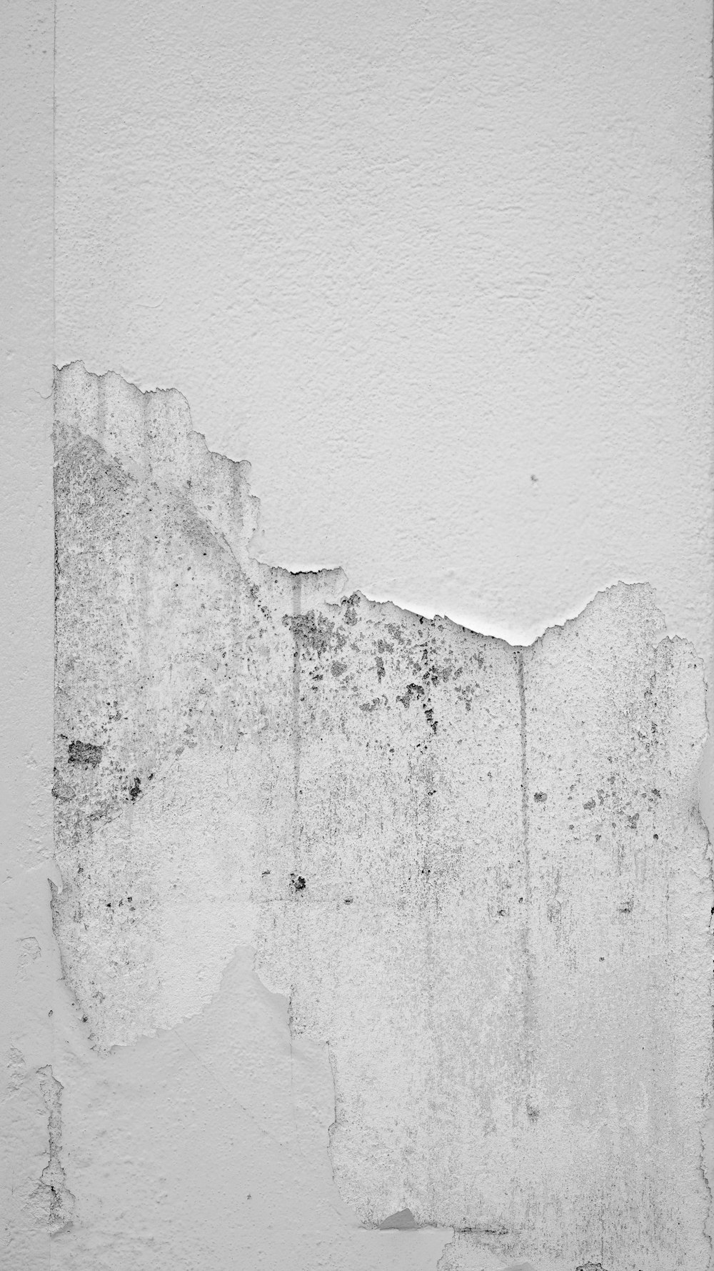 muro di cemento bianco con foro