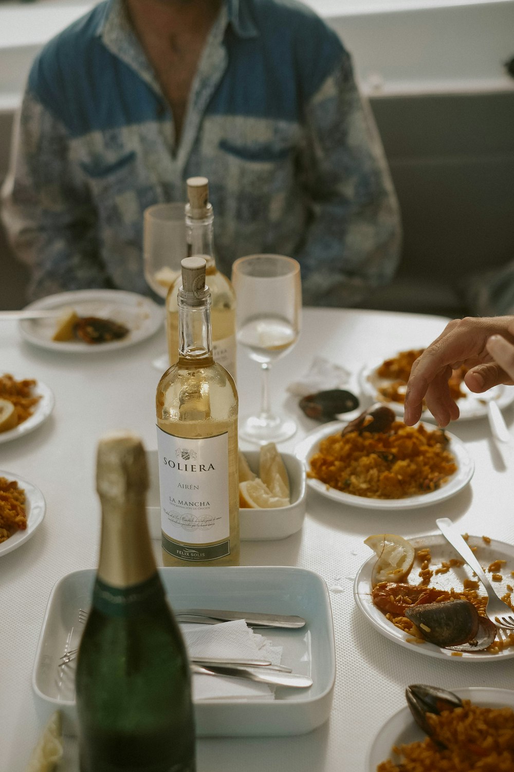 wine bottle and wine glass on table