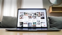 black ipad on brown wooden table