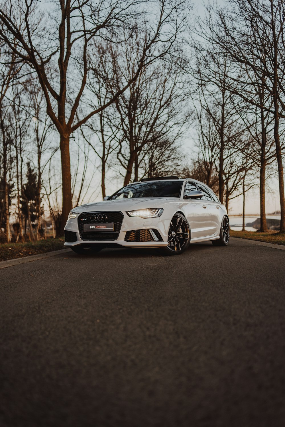 white bmw m 3 on road