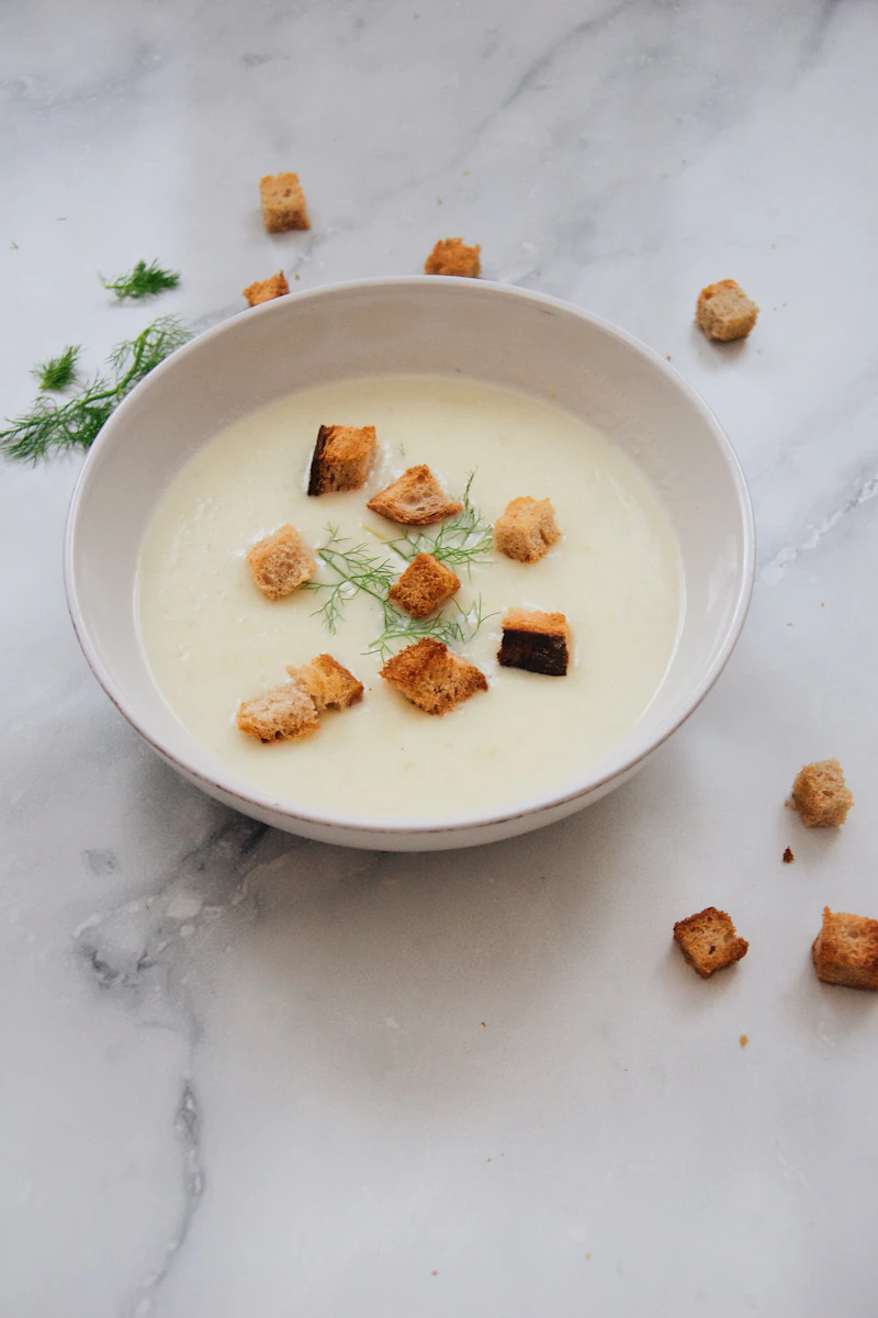 A rustic bowl of thick vegetable soup