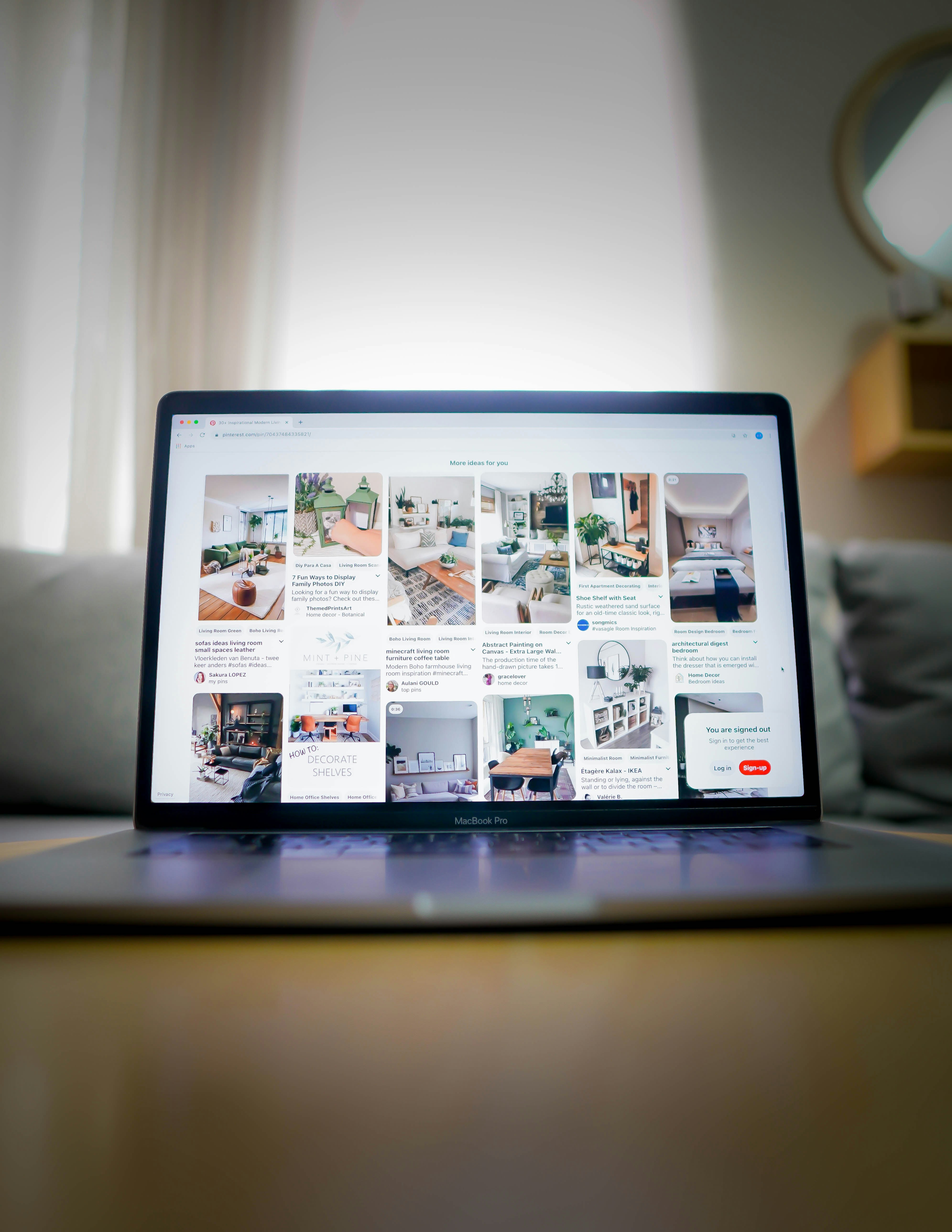 black tablet computer on brown wooden table