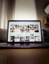 black tablet computer on brown wooden table