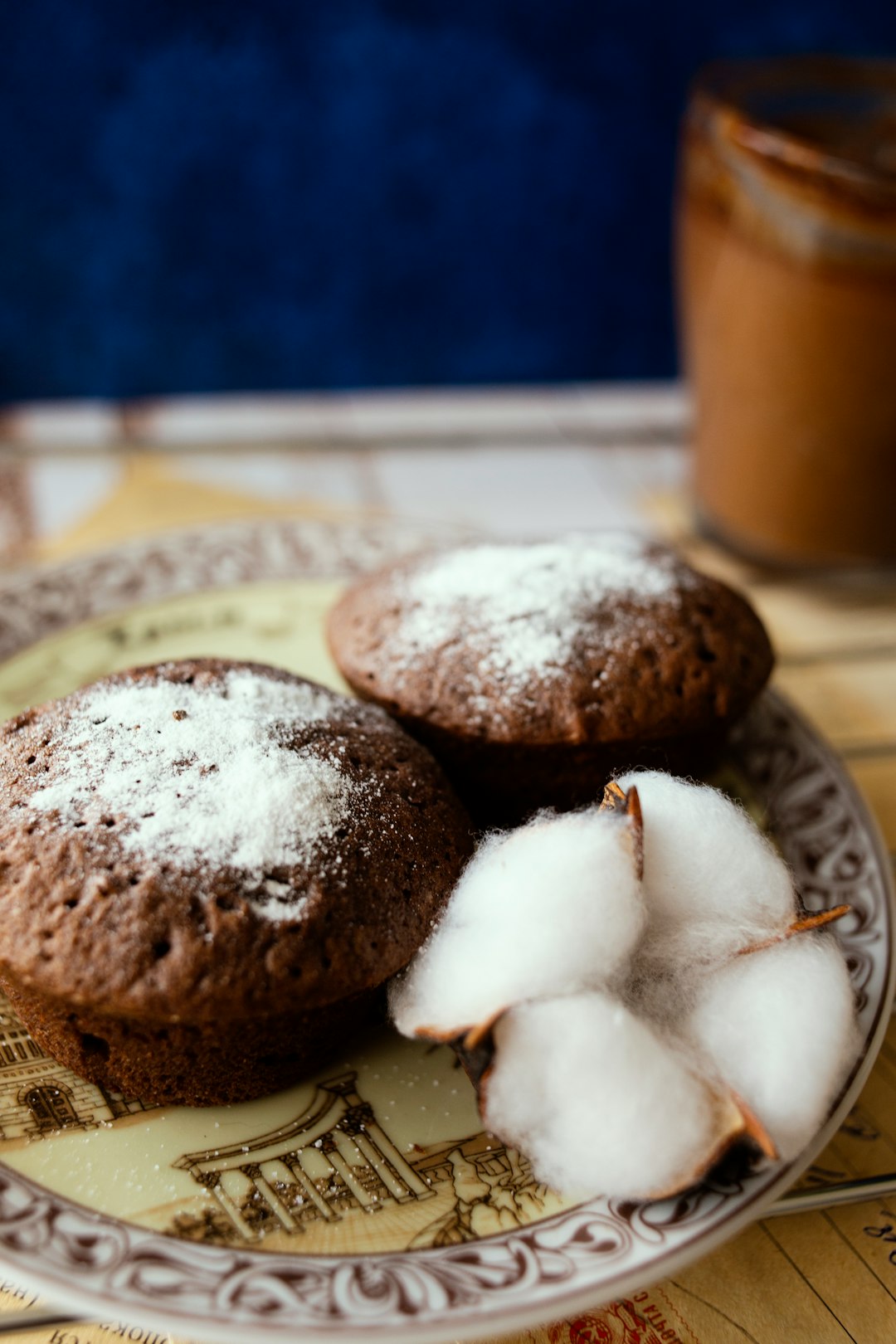 brown cookies on white and blue ceramic plate