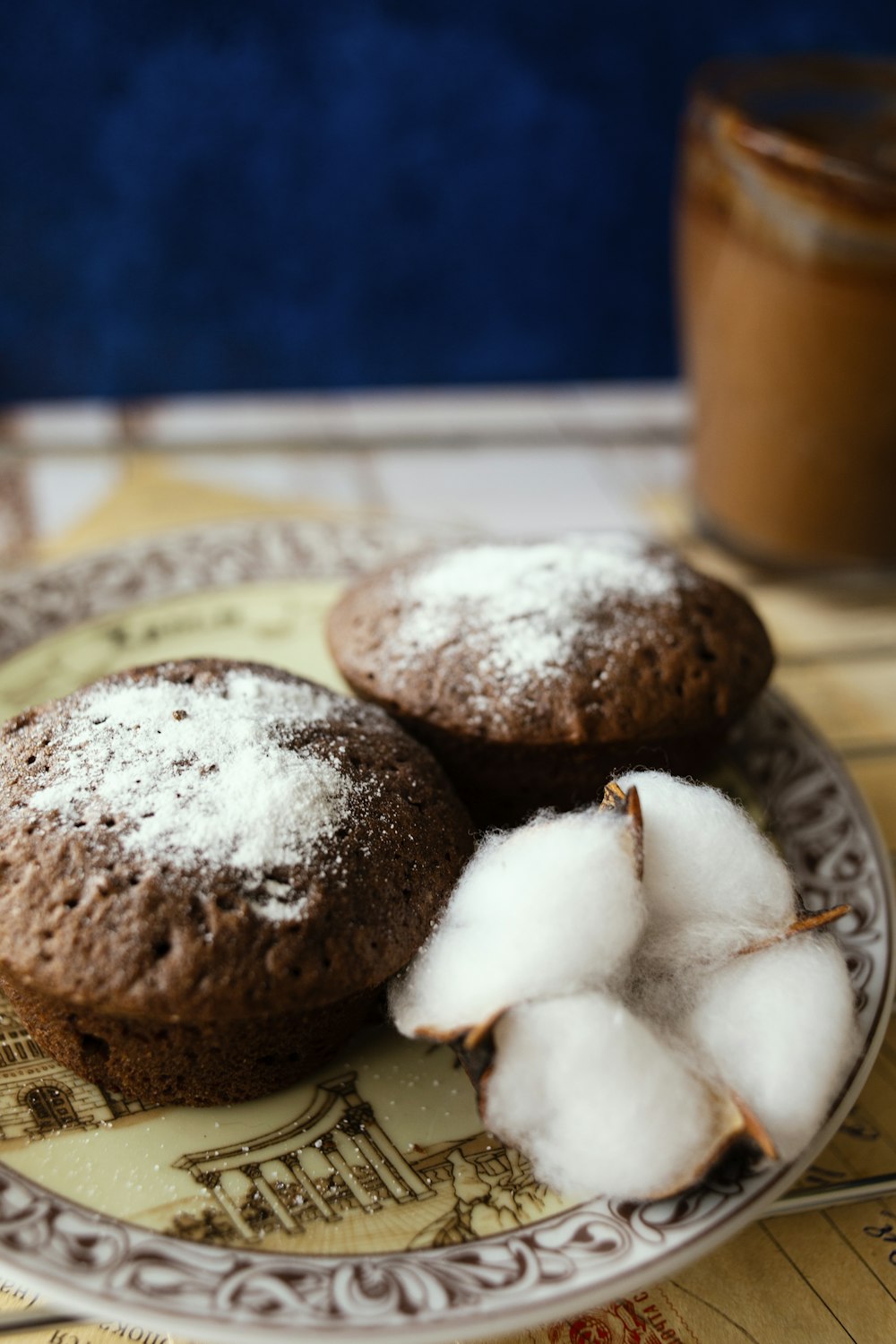 brown cookies on white and blue ceramic plate