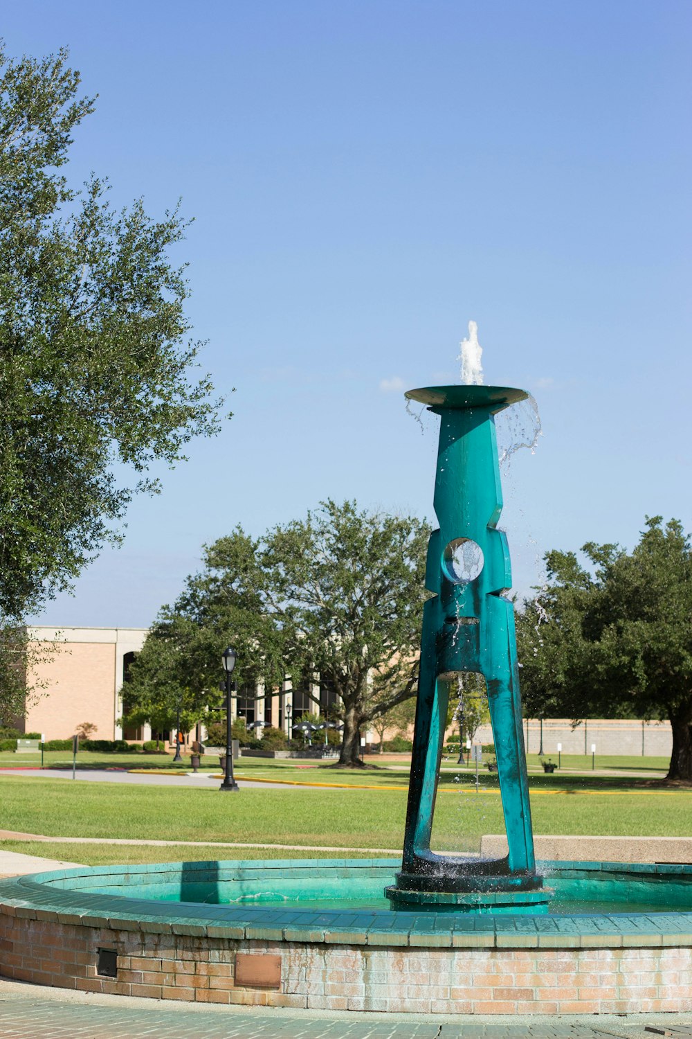 green and white water fountain