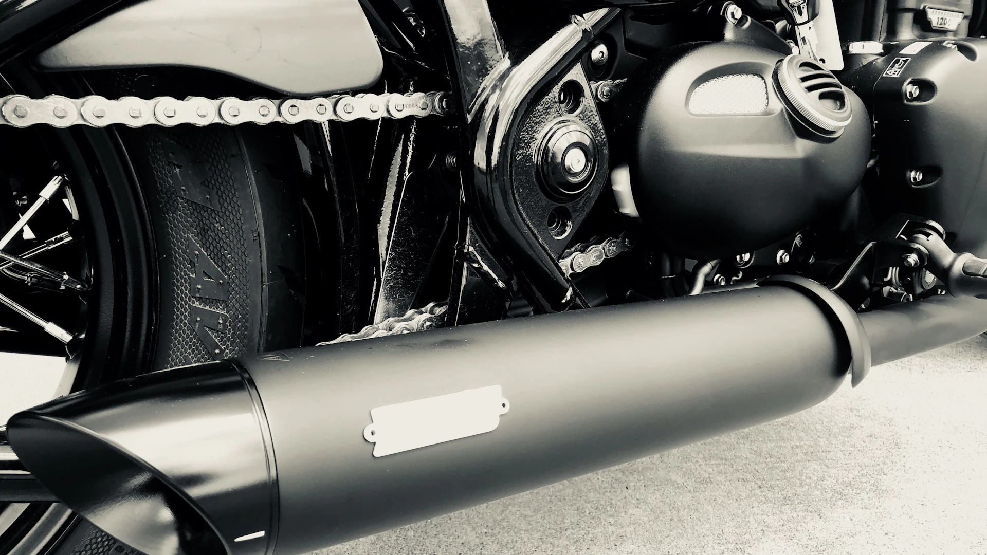 Close-up of the intricate metalwork and craftsmanship details on a sidecar, emphasizing texture and design.