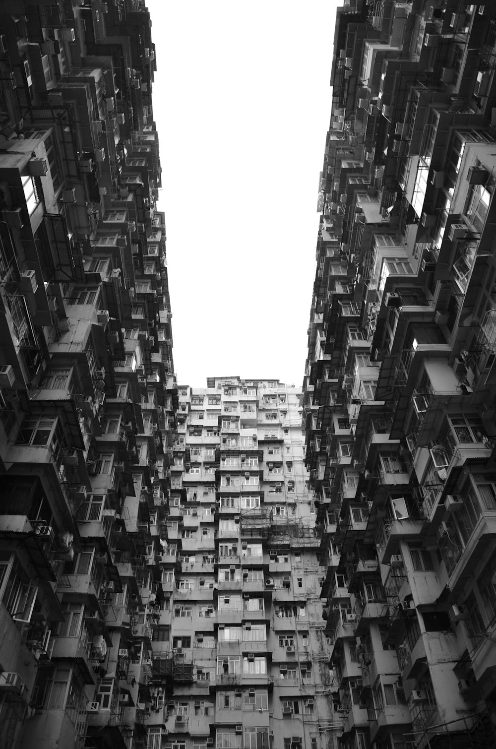 grayscale photo of high rise buildings