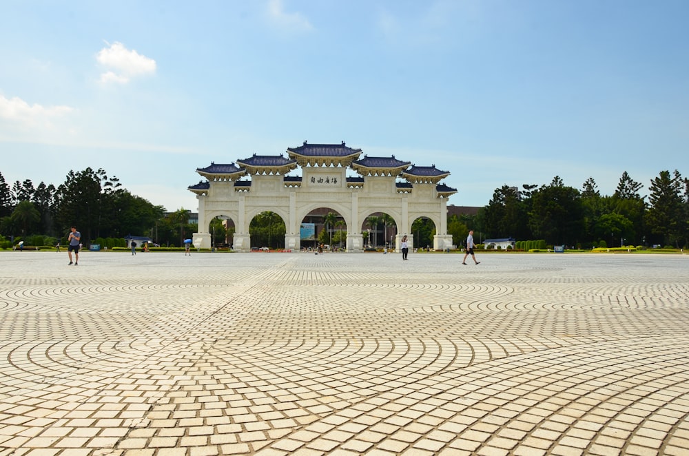 white concrete building under blue sky during daytime