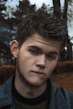 man in black collared shirt