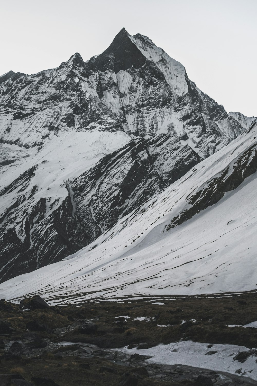 snow covered mountain during daytime