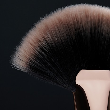 brown hair on white surface