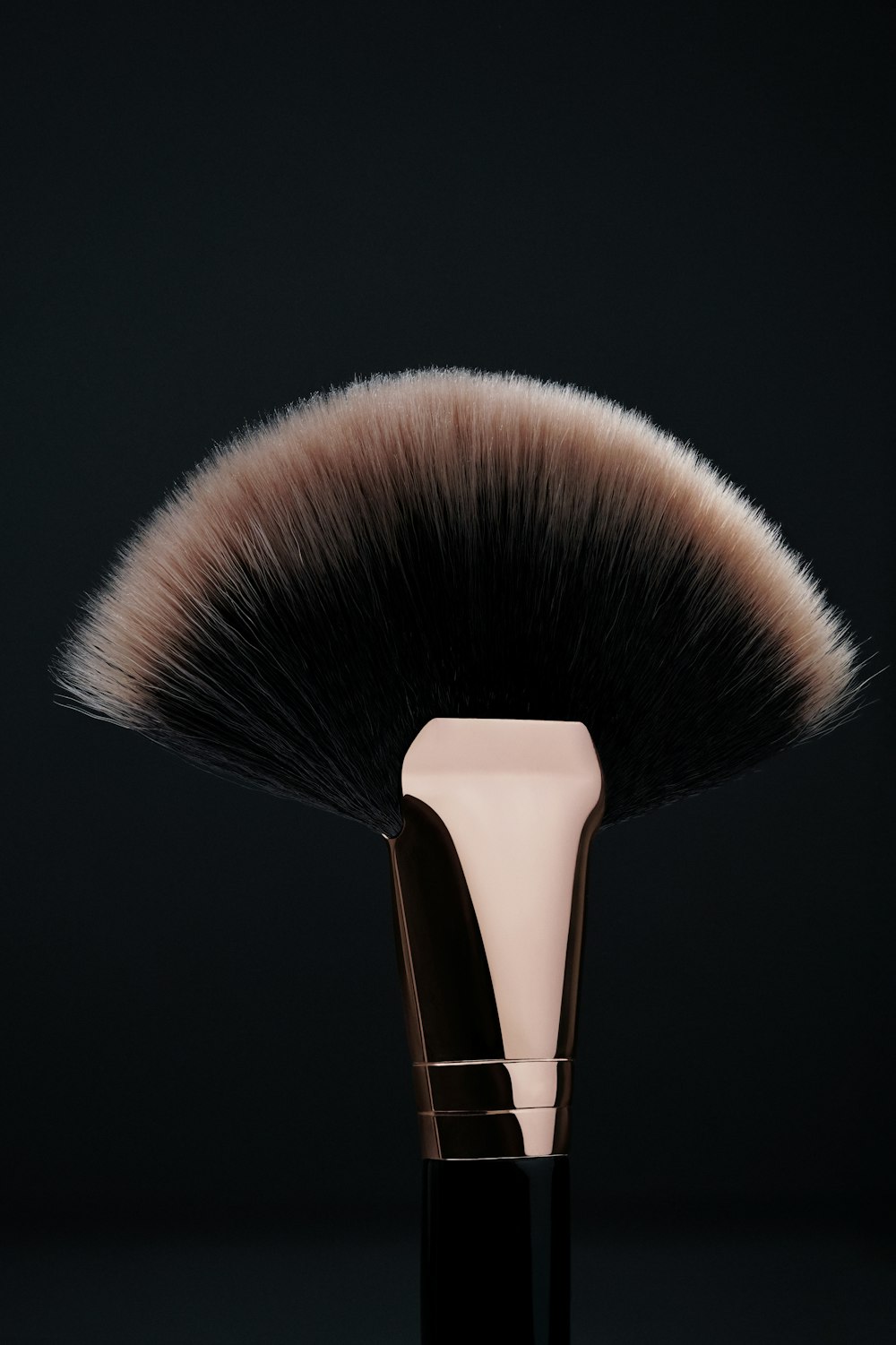 brown and silver makeup brush