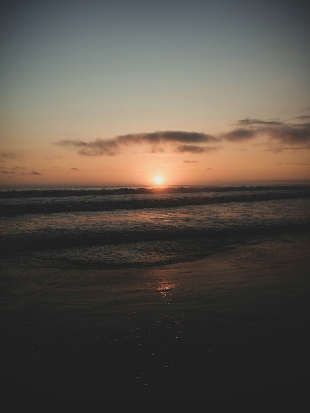 body of water during sunset