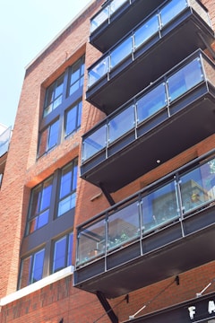 Commercial building facade featuring clean lines and brickwork.