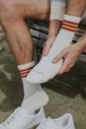 person wearing white nike socks
