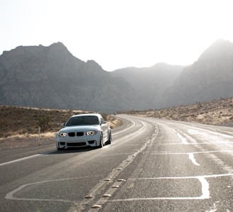 white car on road during daytime