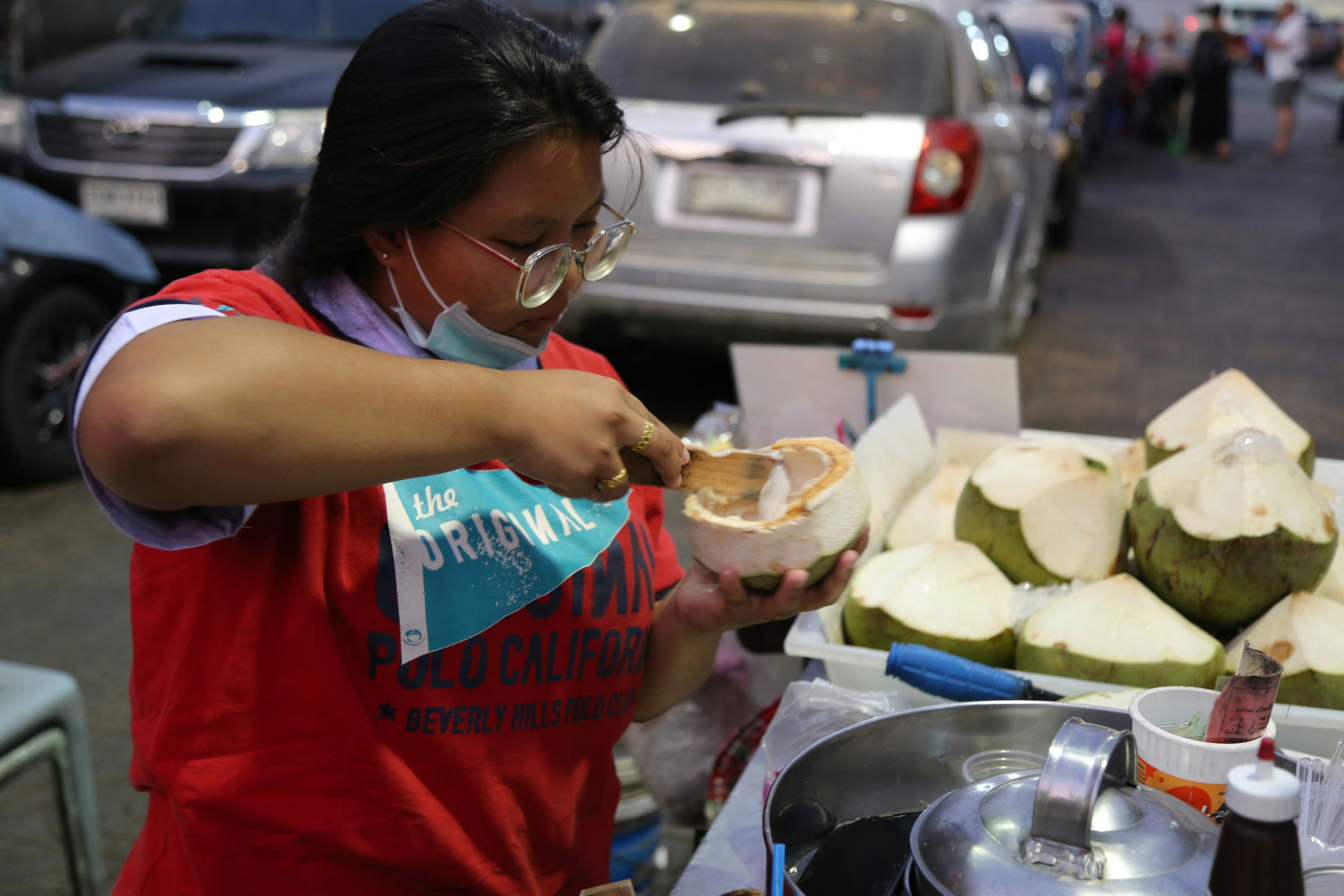 Beachside food stall selling fresh coconut water in Jamaica